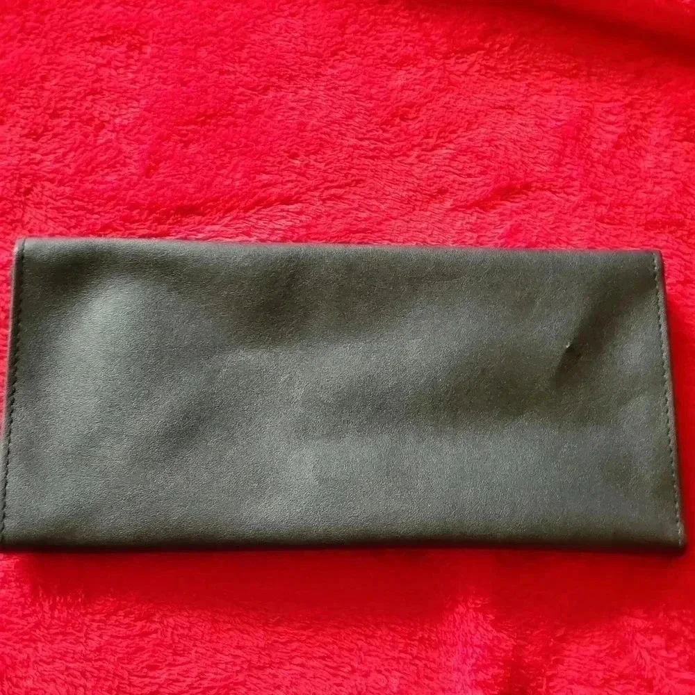 Travel clutch​​​